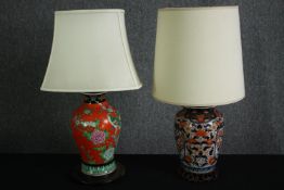Two eastern table lamps, one with Imari decoration, the other decorated with birds and peonies. H.