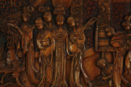 An early 20th century Chinese camphorwood bas relief panel. H.50 W. 50cm.