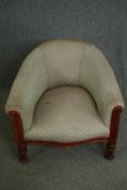 A Victorian walnut and upholstered tub chair. H.69cm.