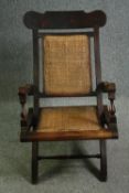 A late 19th century Anglo Indian folding chair with wicker seat and back.