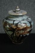 A studio glazed ceramic lidded ginger jar. H.26cm.