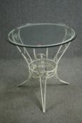 An early 20th century French white painted wirework metal garden or conservatory table with later
