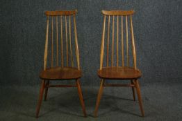 A pair of beech and elm Ercol Goldsmith 369 dining chairs. H.96cm. (each).