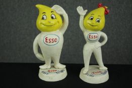 A pair of reproduction cast metal Esso advertising money boxes in the form of Andy and Abbey