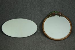 Two mid century wall mirrors. H.54 W.51cm. (largest).