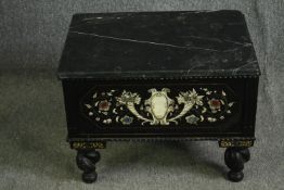 A North European ebonised and inlaid box with marble top fitted with drawers to each side. H.48 W.63