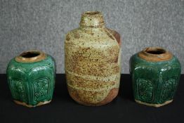 A pair of Chinese pottery hexagonal green glaze vases, together with a salt glazed studio pottery