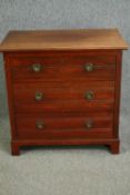 An Edwardian walnut chest of drawers of compact size. H.81 W.83 D.51cm.