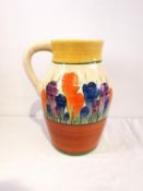 Clarice Cliff - Crocus - A single handled Lotus jug circa 1930, hand painted with Crocus sprays