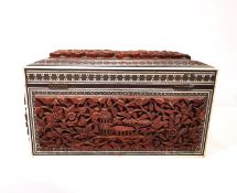 A 19th century Indian Sadeli ware sandal wood correspondence box, the panels heavily carved with