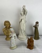 A Parianware classical figure along with a miscellaneous collection of porcelain figures. Tallest