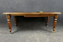 A William IV style mahogany wind-out extending dining table with one extra leaf. H.78 W.150 (
