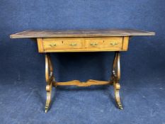 A Regency style walnut and crossbanded sofa table, circa 1900. H.75.5 W.81 D.51cm Extended 120.5cm