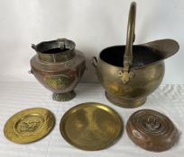 A collection of brass and copper items.