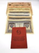 A collection of eight Soviet era Russian foreign banknotes and an issue booklet. L.17.5 H.10 cm