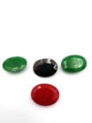 A collection of loose cut gem stones, emerald, ruby and sapphire. L.1.9 W.1.4cm