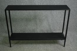 A contemporary metal console table. H.79 W.110 D.26cm.