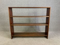 A vintage teak open bookcase. H.107 cm x W.127 cm x D.27 cm