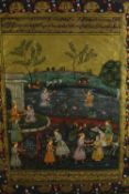 A framed and glazed Indian watercolour, figures in a palace garden. H.47 W.37cm.