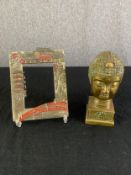 A vintage brass Buddha's bust along with a Japanese embossed metal picture frame. H.19cm x W.6.5m