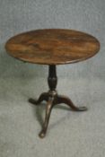 A George II oak occasional table. H.70 Dia.75cm.