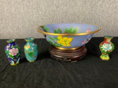 A collection of cloisonne items to include a bowl on carved hardwood stand and three vases. H.10cm x