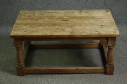 An early 20th century pine coffee table. H.42 W.91 D.61cm.
