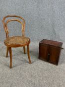 A bentwood child's chair along with a 19th century oak cabinet. H.57cm x W.31cm x D.46cm (largest)