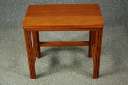 A mid century Danish teak nest of tables by Peter Hvidt and Orla Mollgaard-Nielsen for France and