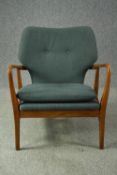 Lounge armchair, retro style hardwood frame in buttoned teal upholstery. H.83cm.