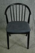 A vintage style hooped back ebonised armchair. H.80cm.