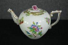 A hand decorated Herend teapot. H.12cm.