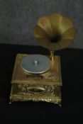 A vintage table lighter in the form of a musical gramophone. H.17cm.