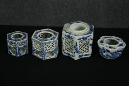 Three Chinese reticulated hexagonal cricket cages along with a similar candle burner. H.10cm. (