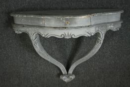 A French Louis XV style painted wall console or bracket. H.72 W.81 D.31cm.