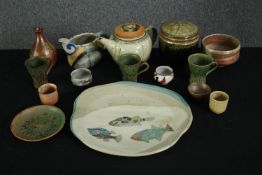 A mixed collection of art pottery and stoneware items. L.32 W.29cm. (largest).