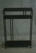 A contemporary metal open side table. H.86 W.56 D.21cm.