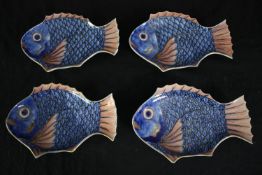 A set of four Chinese fish serving dishes. L.24 W.16cm. (each).