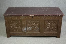Coffer, 18th century carved oak, later painted. H.61 W.133 D.54cm.