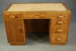 Desk, mid century light oak. (Has no inset writing service). H.76 W.121 D.64cm.