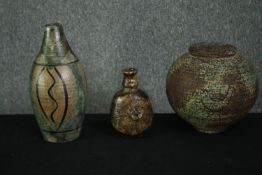 Three various stoneware vases, signed. H.33cm. (largest).
