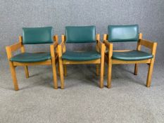 Armchairs, mid century faux leather and light oak frame. H. 78 cm x W. 57 cm x D. 49 cm