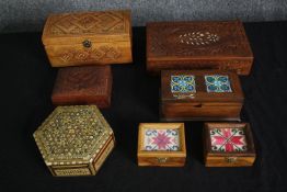 A Damascus inlaid lidded box together with a miscellaneous collection of boxes. H.6 W.25 D.15cm. (