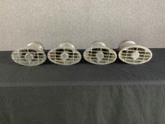A set of four vintage aluminium German merchant navy light fittings. H.29 cm W.25 cm x D.14 cm