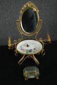 A 19th century French gilt metal and hand decorated porcelain watch and jewellery holder in the form