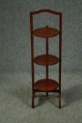 Cake stand, Edwardian mahogany with folding action. H.87cm.