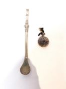 An alpaca silver mate straw with scrolling foliate design along with a Victorian silver fob watch,