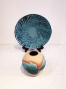 Peter Beard, British (1951-), a conical stoneware bowl covered in turquoise glaze with swirling