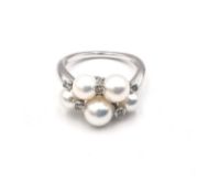 An 18ct white gold Mikimoto Akoya cultured pearl and diamond bubble ring set with five white round