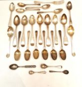 A large collection of 19th century silver and white metal spoons, including a set of three